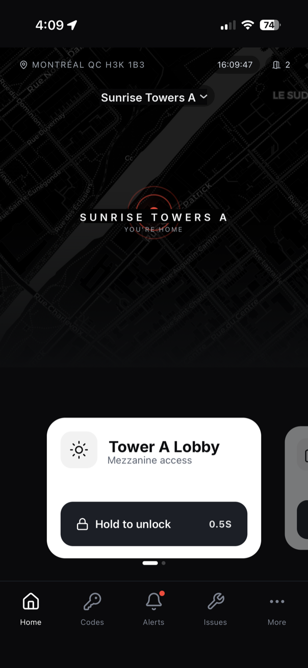 ACCESS resident app — building dashboard with hold-to-unlock